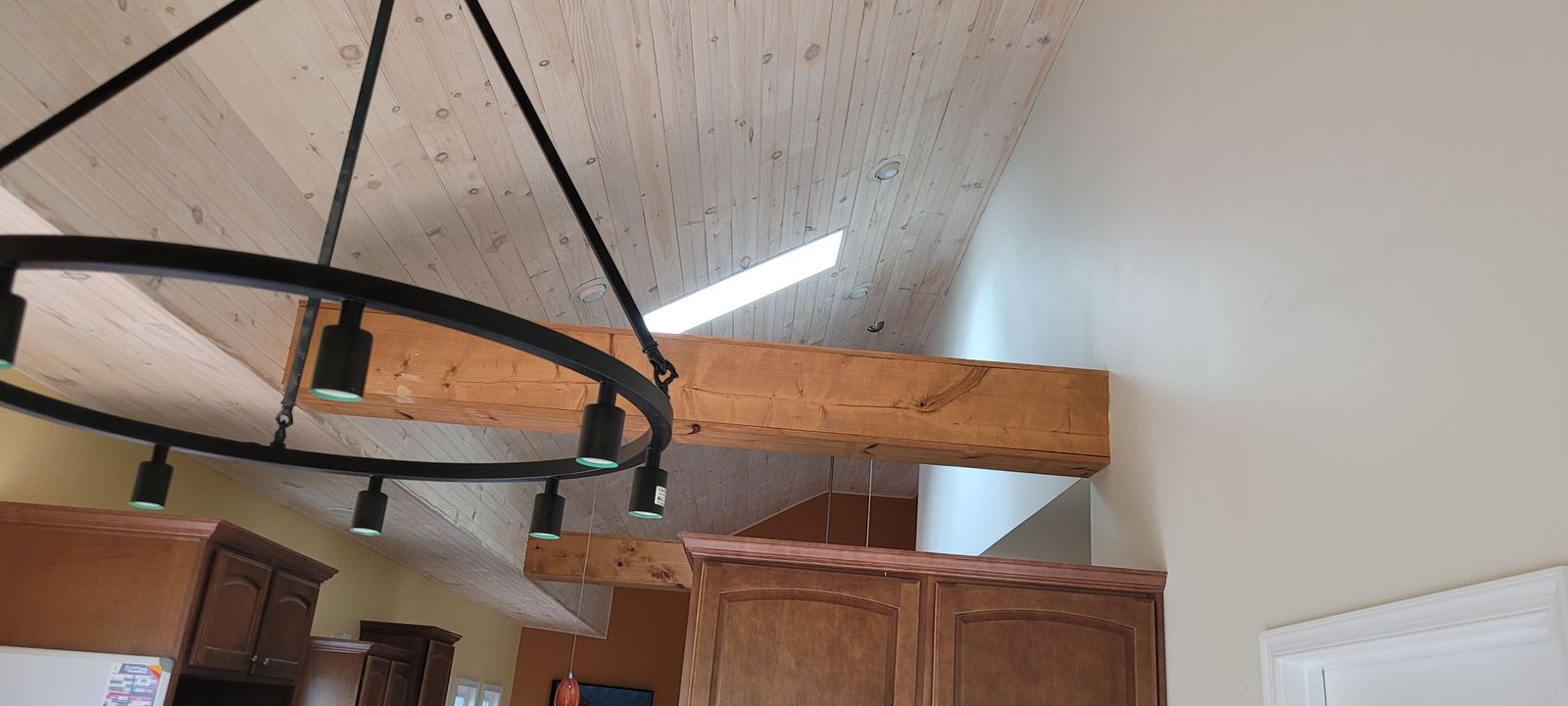 Vaulted tongue and groove ceiling with clerestory light