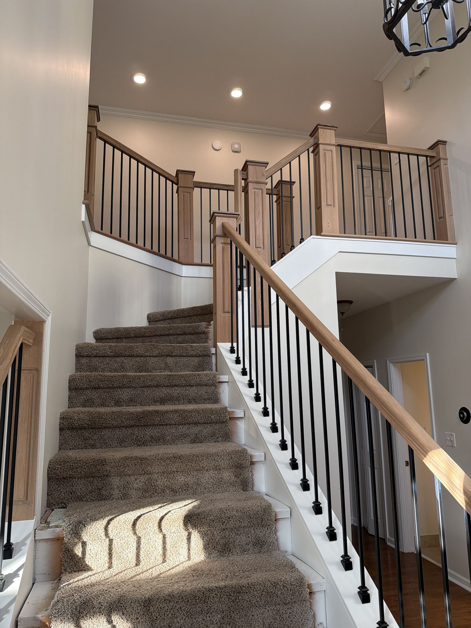 Oak & Iron Foyer Staircase — detail 5