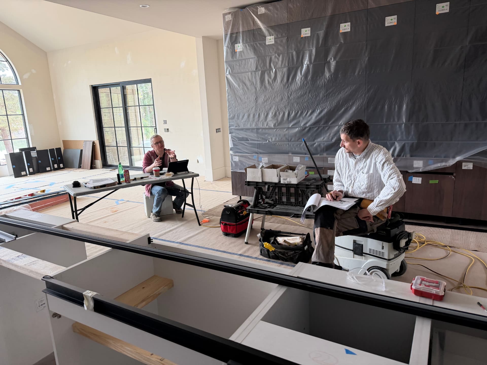 Blue Ridge Carpenters team reviewing project plans on site