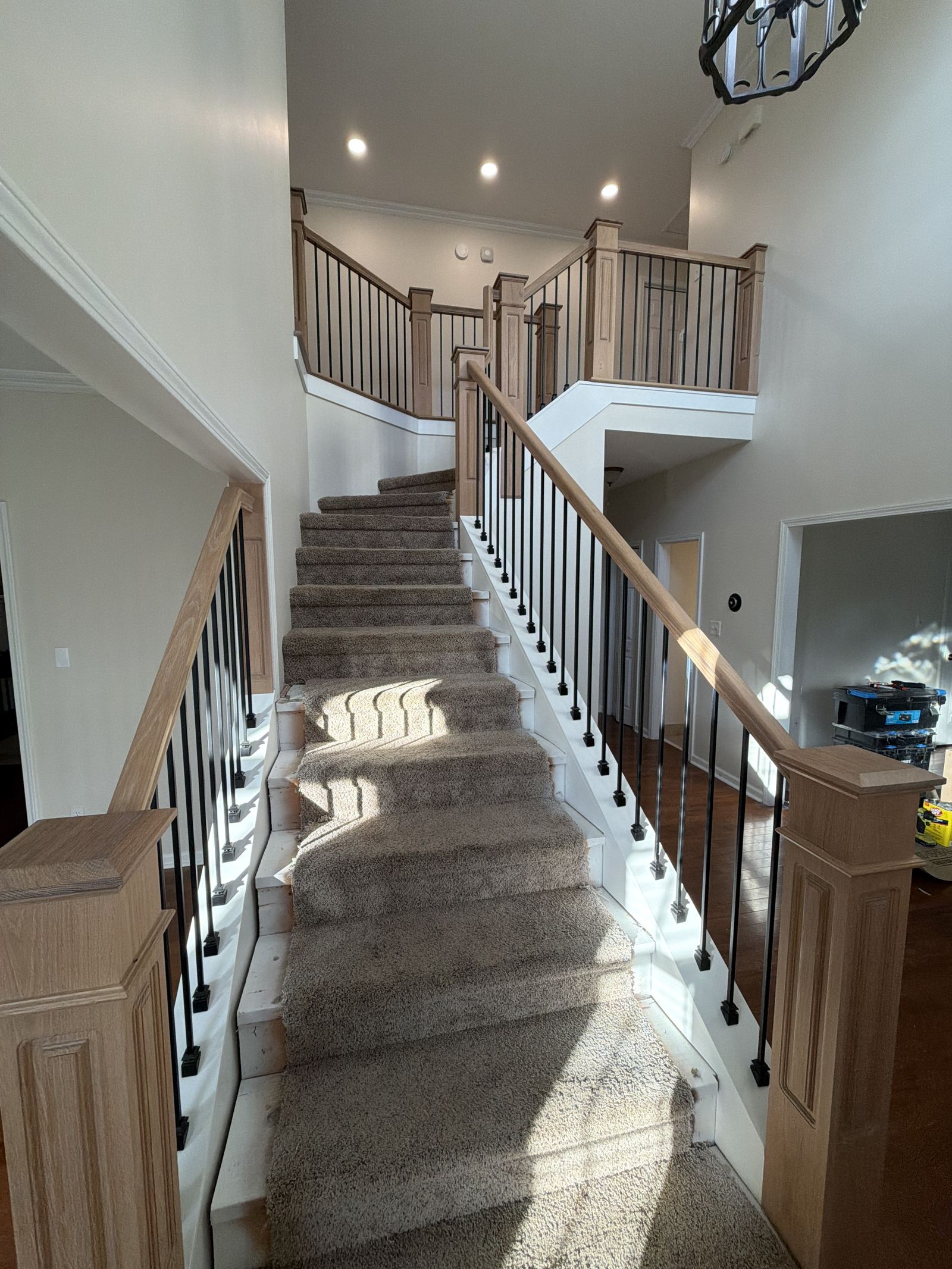 Oak & Iron Foyer Staircase — detail 7